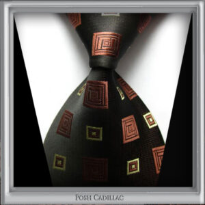 Brown-squared-with-yellow-gold-tie-Posh-Cadillac-main-txt-web-S